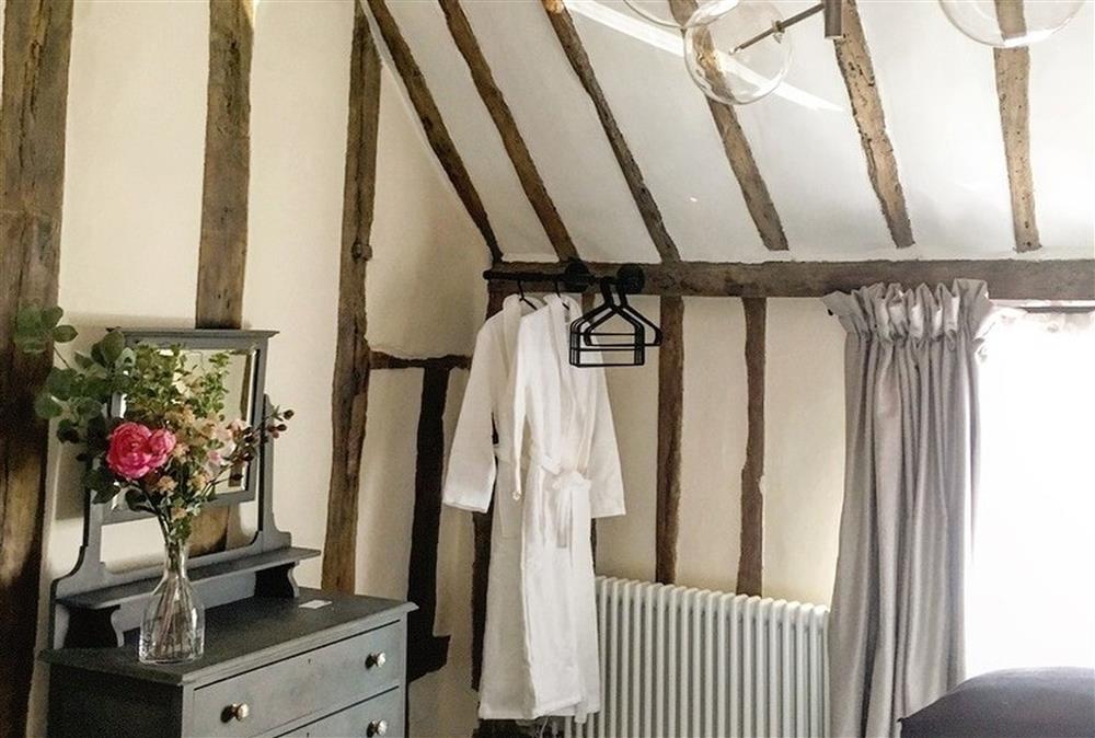 Bedroom with dressing area at Blacksmiths Cottage, Lavenham