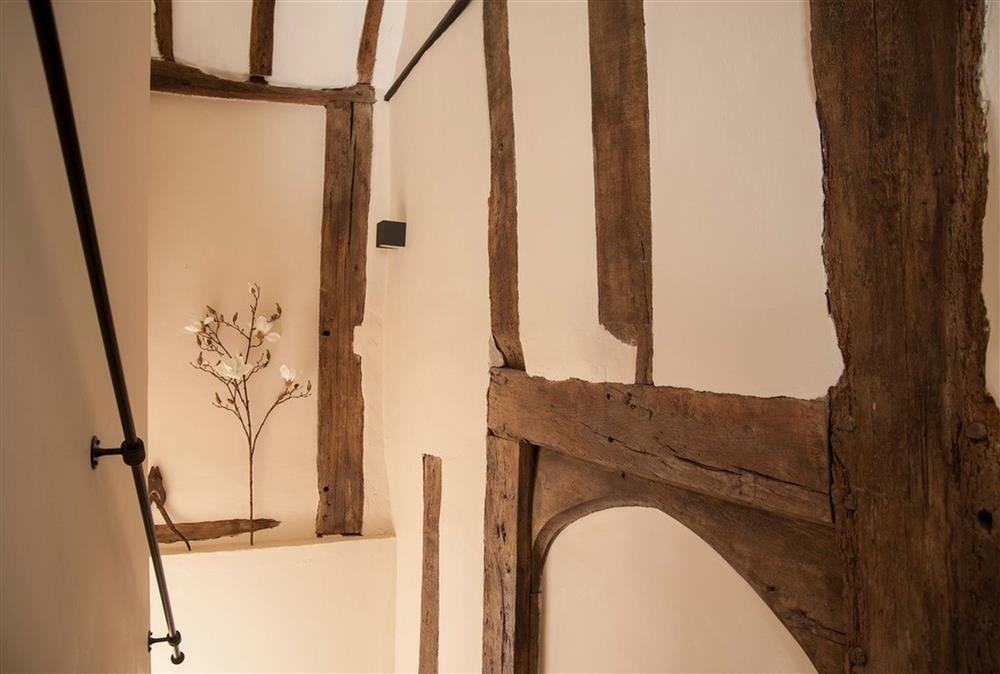 The original exposed beams give a glimpse at the unique building style of the past at Blacksmiths Cottage, Lavenham