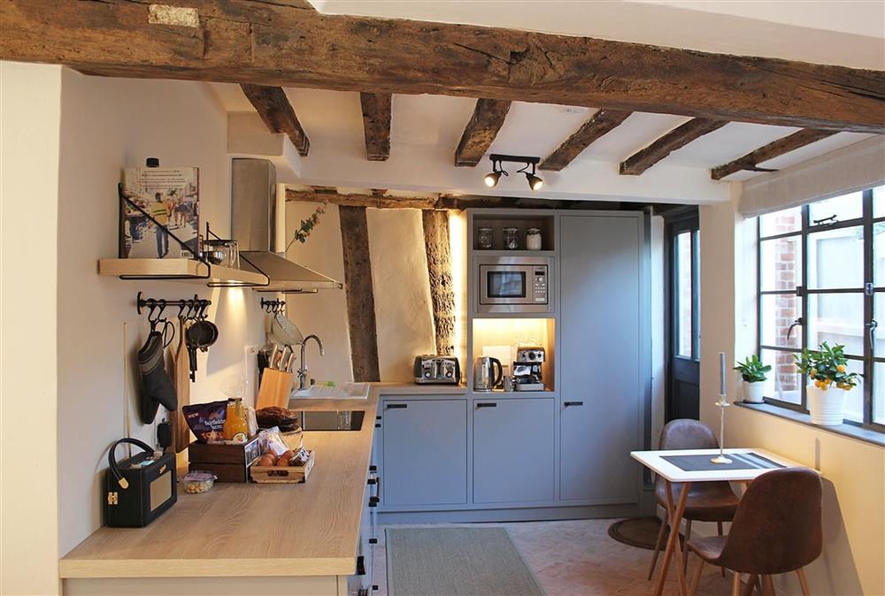 Well-equipped kitchen with modern appliances at Blacksmiths Cottage, Lavenham