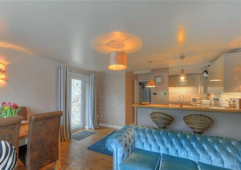 Relax in the living area at Blacksmiths Cottage, Lyme Regis