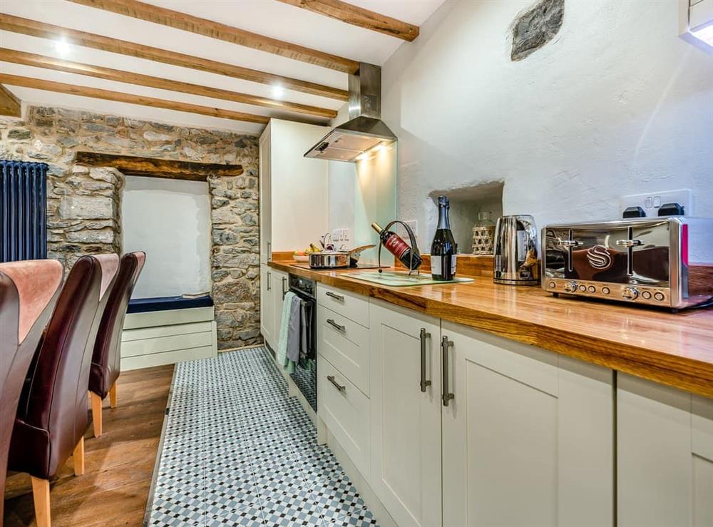 Kitchen area (photo 2) at Blacksmiths Cottage in Pembroke, Dyfed
