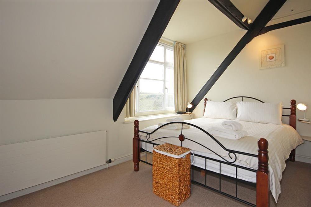 Master bedroom with double bed at Blackstone Cottage in Devon Road, Salcombe