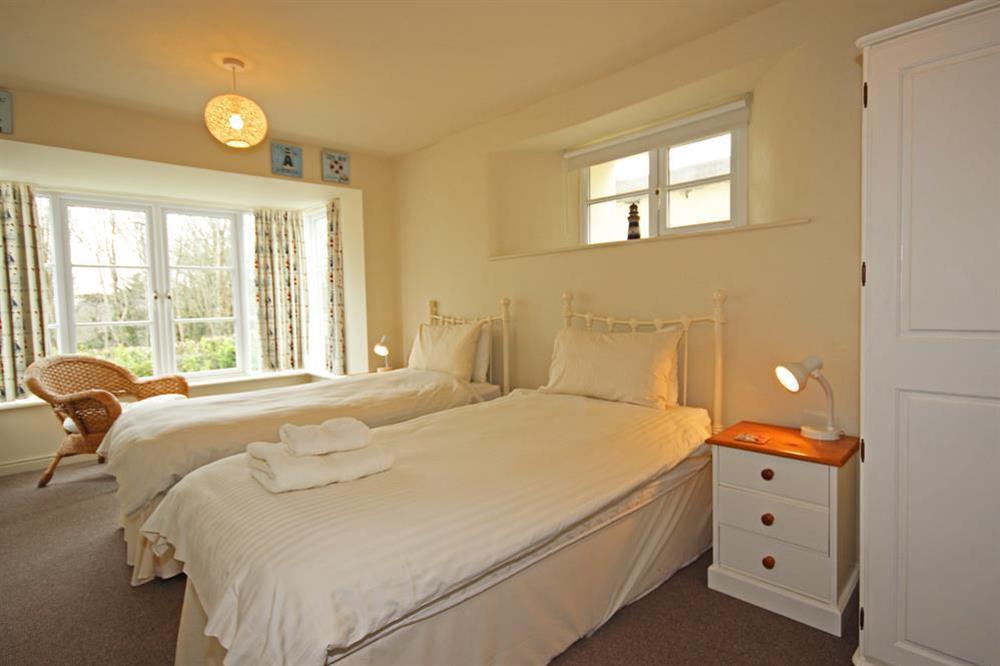 Twin bedroom on lower ground floor at Blackstone Cottage in Devon Road, Salcombe