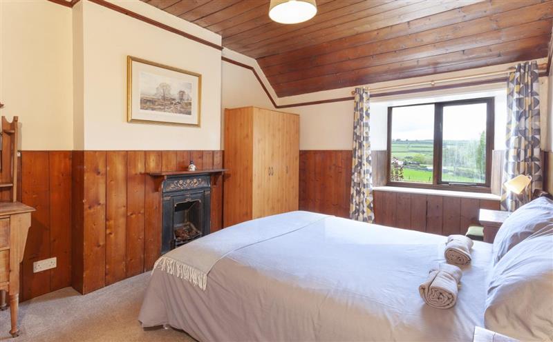 A bedroom in Blagdon Cottage at Blagdon Cottage, Wheddon Cross