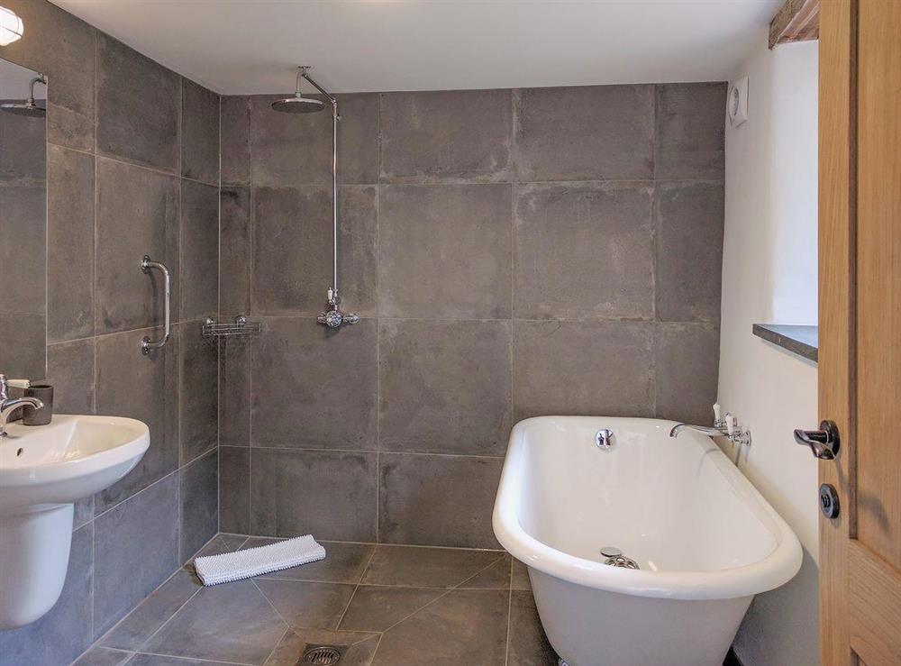 Wet room with standalone bath at Cherry Cottage, 