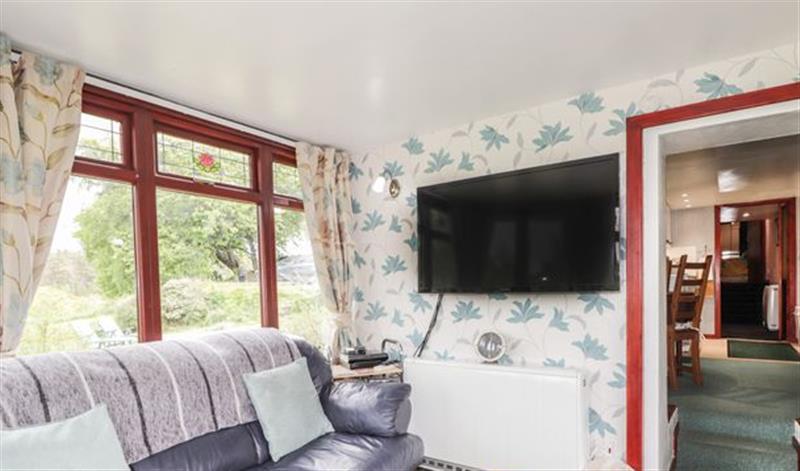 Relax in the living area at Blairgorm Croft, Grantown-on-Spey