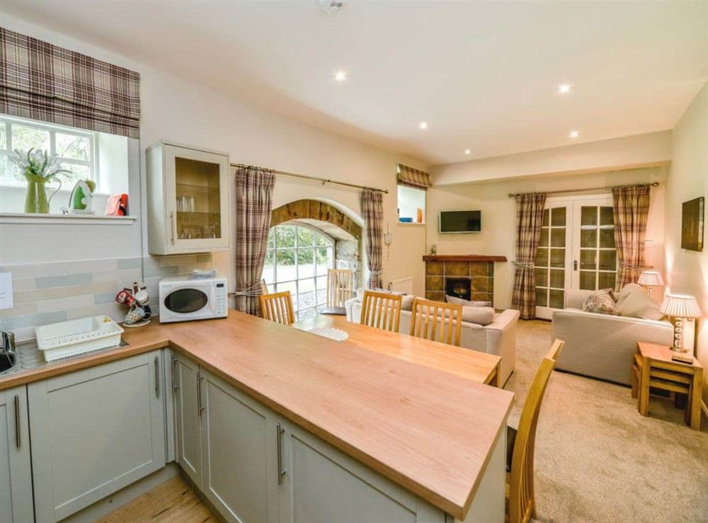 Charming open plan living/dining room/kitchen at Cunninghame Cottage, 