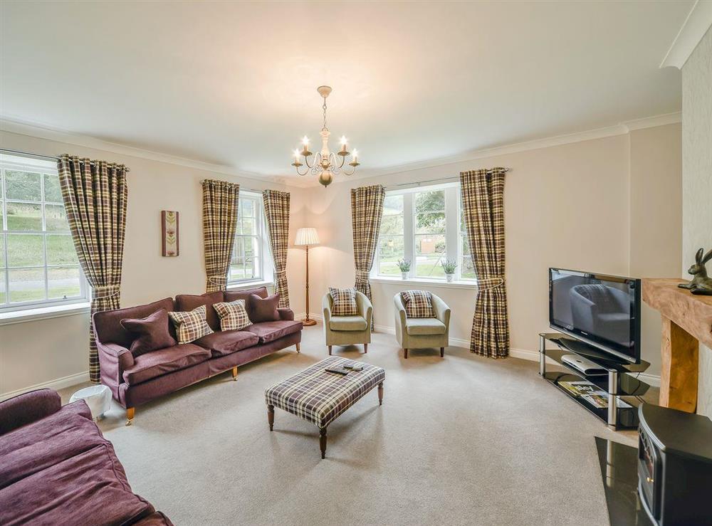 Spacious and elegant living room at McKenzie Cottage, 
