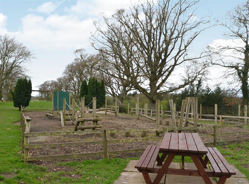 Superb children’s play area and picnic style outdoor seating at Blaithwaite House, 