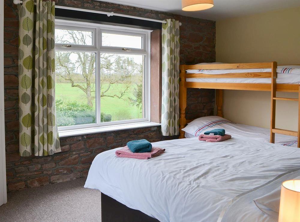 Double bedroom with bunk beds at Blaithwaite Stables, 