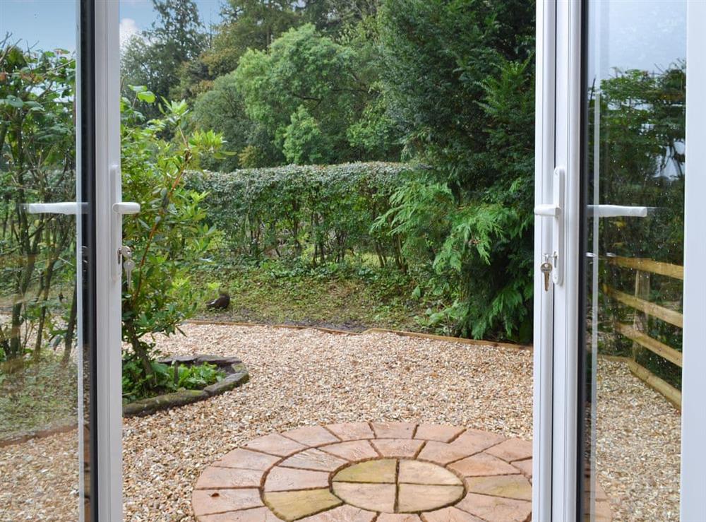 Patio doors leading to outdoor area at Bridge Cottage, 