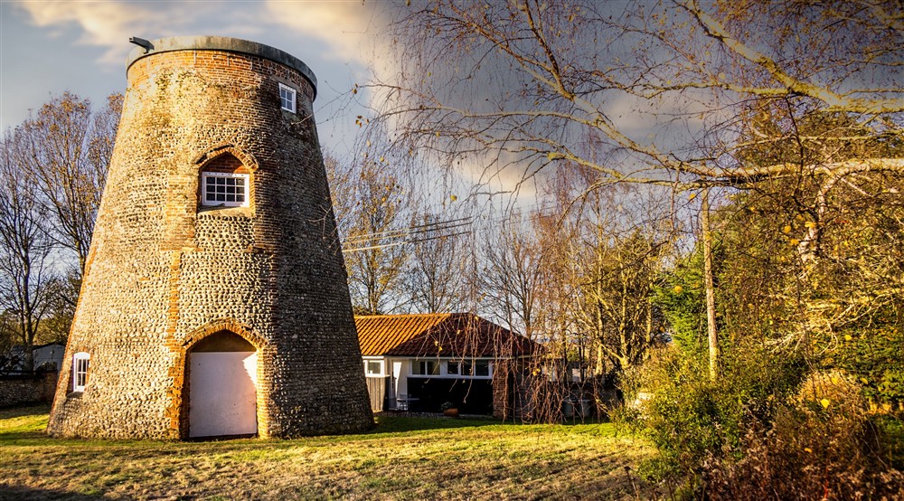 The Old Mill on the lawn in front of Blakeney Lodge, Norfolk at Blakeney Lodge in Blakeney, Norfolk