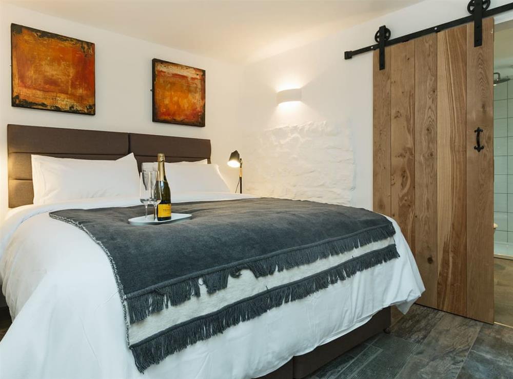 Romantic double bedroom with en-suite shower room (photo 2) at Blakeskerra Barn in Kenfig, near Porthcawl, Glamorgan, Mid Glamorgan