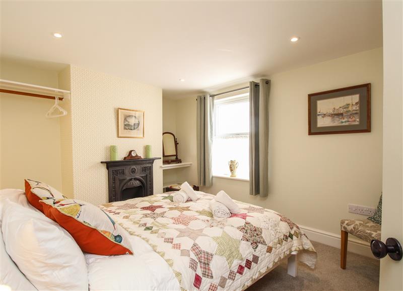 This is a bedroom at Blanche Cottage, Brewers Quay Harbour