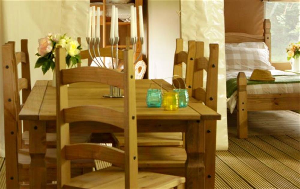 A pine table and high-backed chairs seat six with ease at Bleasdale, Bleasdale