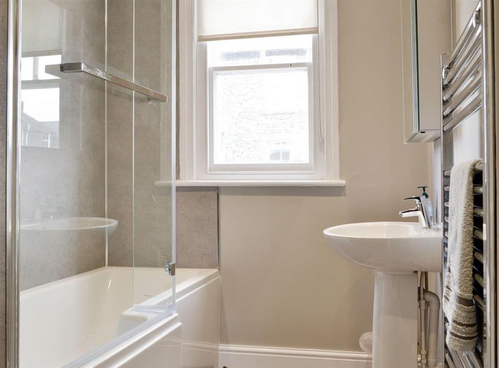 Family bathroom with shower over bath at Blencathra House in Keswick, Cumbria