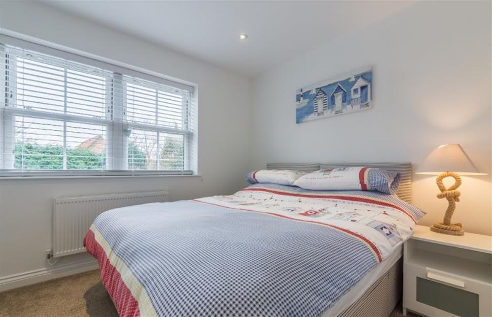 First floor: Bedroom two can be made up as a king or twin room at Blossom Cottage, Brancaster near Kings Lynn
