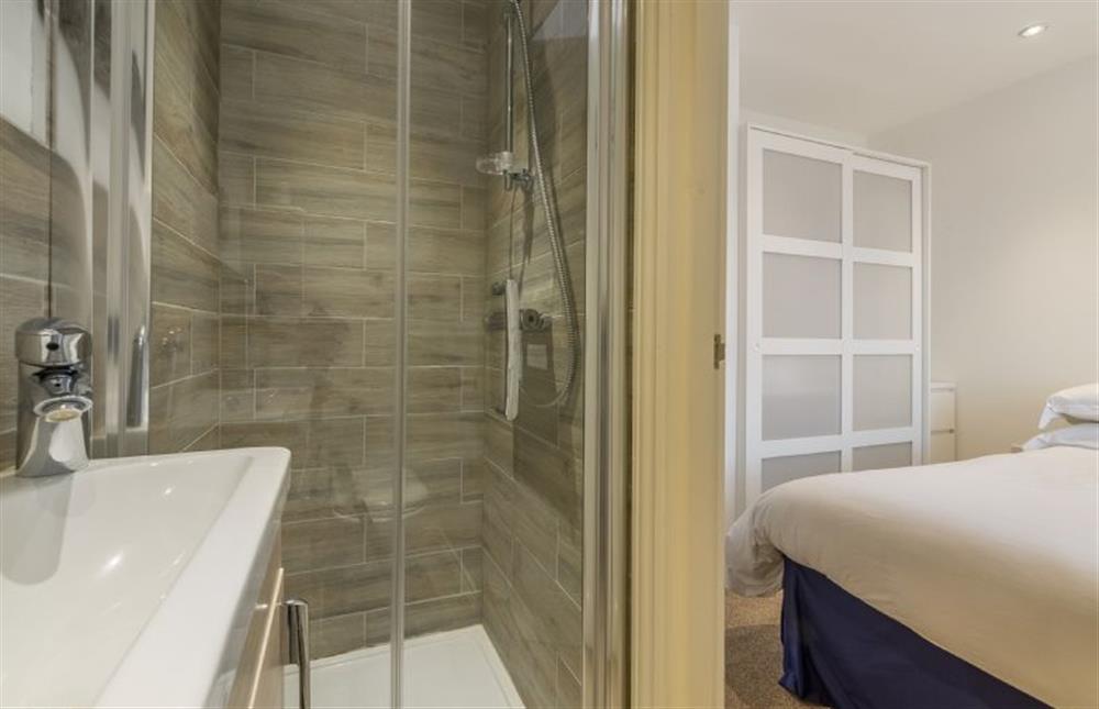 First floor: The en-suite shower room at Blossom Cottage, Brancaster near Kings Lynn