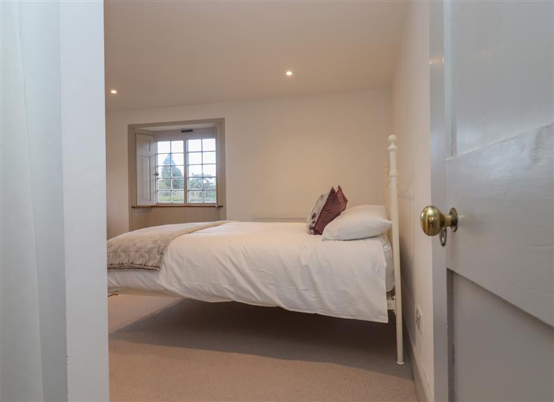A bedroom in Blossom Cottage at Blossom Cottage, Chipping Campden