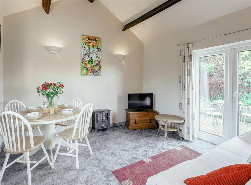 Living room/dining room at Blossoms Cottage in Hassocks, West Sussex