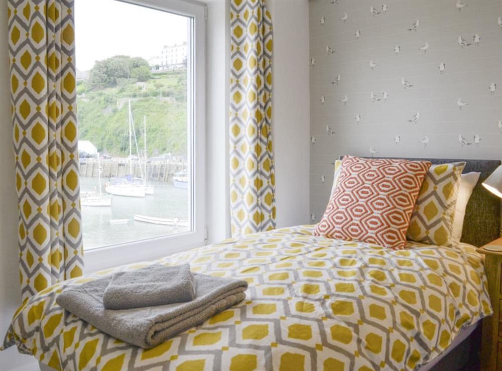 Good-sized twin bedroom at Blue Beach House in Ilfracombe, Devon