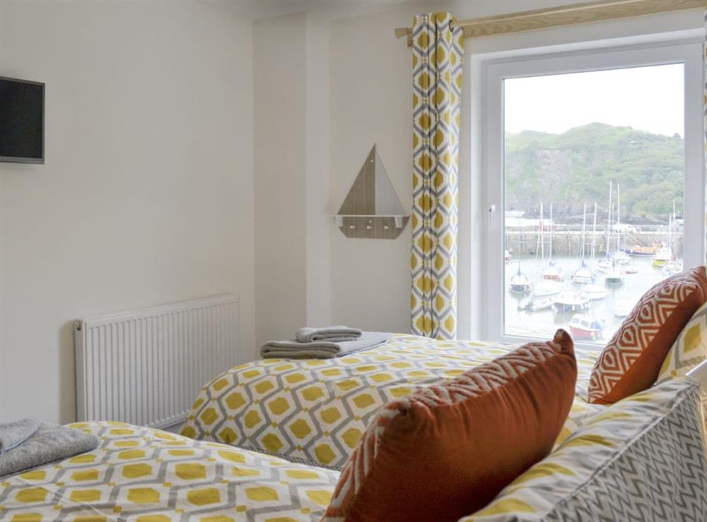 Light and airy twin bedroom at Blue Beach House in Ilfracombe, Devon