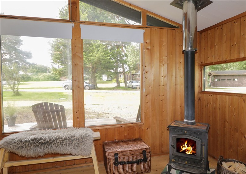 This is the living room (photo 2) at Blue Pine Lodge, Dornoch