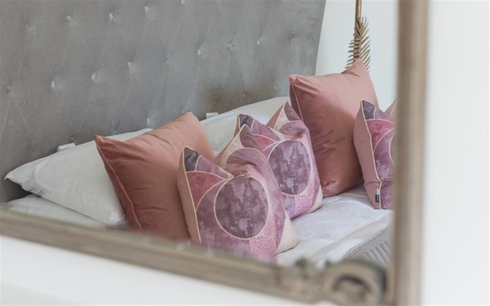 Bedroom 2 pink accents at Blue Shore in Lyme Regis