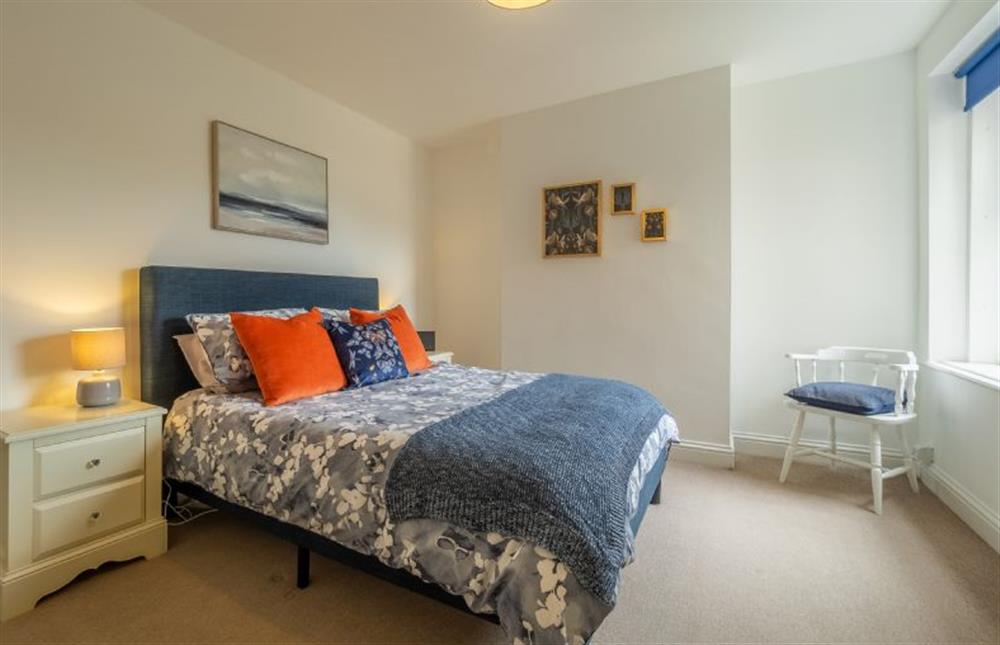 First floor: Light and airy master bedroom at Blue Skies Apartment, Hunstanton