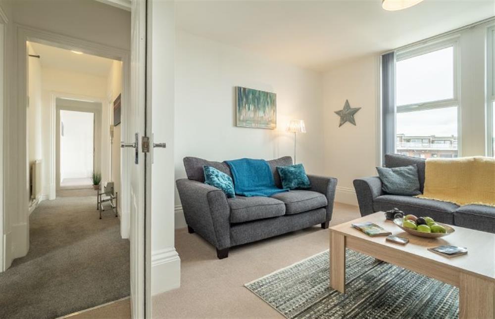 First floor: Sitting room with plenty of space at Blue Skies Apartment, Hunstanton