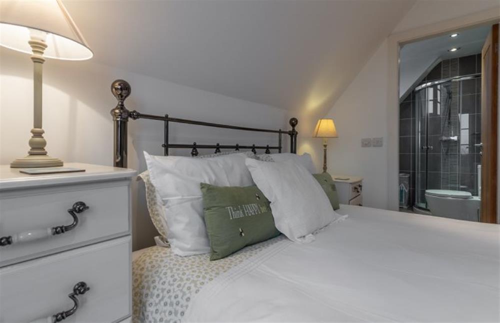 First floor: Master bedroom with king-size bed at Blue Skies, Old Hunstanton