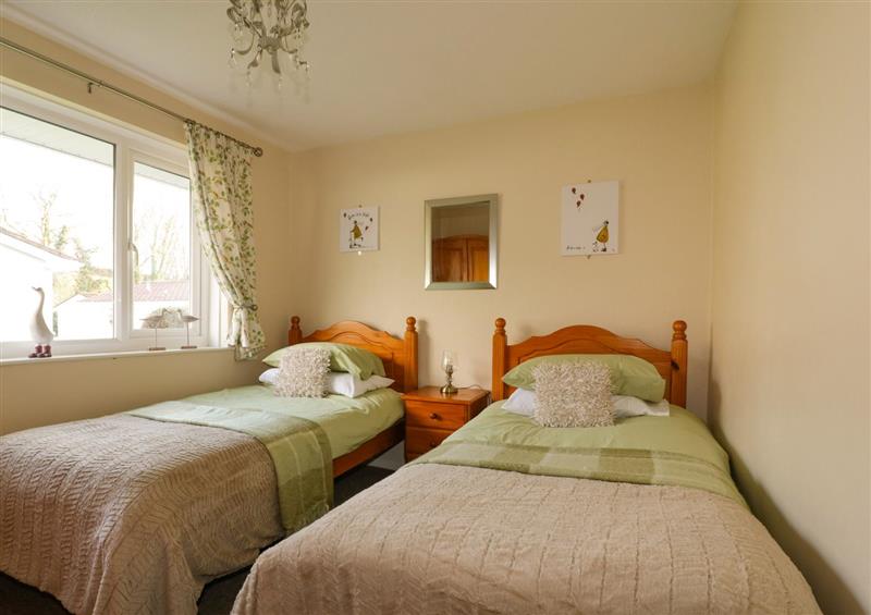 A bedroom in Blue Sky Cottage at Blue Sky Cottage, Rosecraddoc Lodge near Liskeard