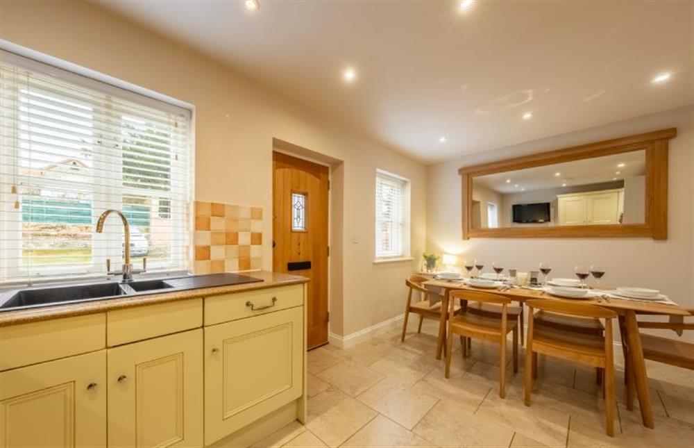 Ground floor: Kitchen with dining area at Blue Sky, Wells-next-the-Sea