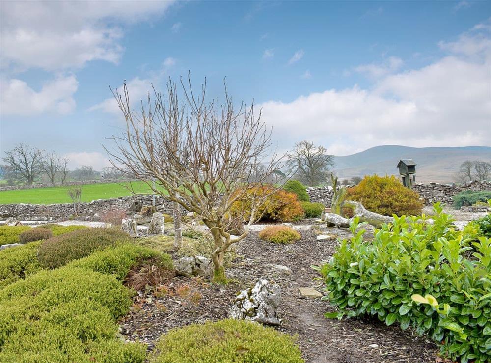 Attractive garden and grounds at Bluebell Barn in Newbiggin on Lune, near Kirkby Stephen, Cumbria