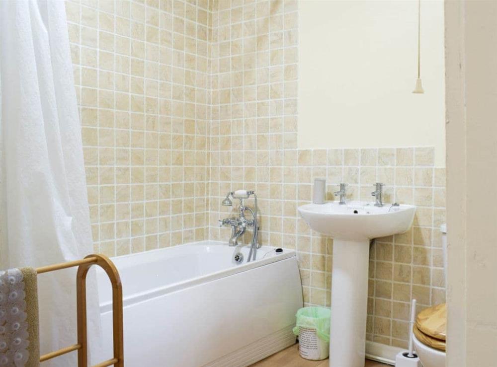 Bathroom with shower over bath at Bluebell Cottage in Calder Vale, near Garstang, Lancashire