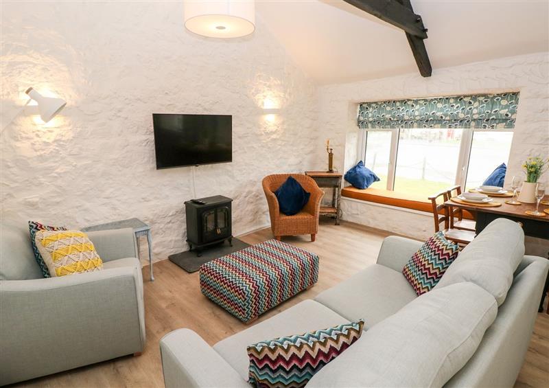 Relax in the living area at Bluebell Cottage, Jameston near Manorbier