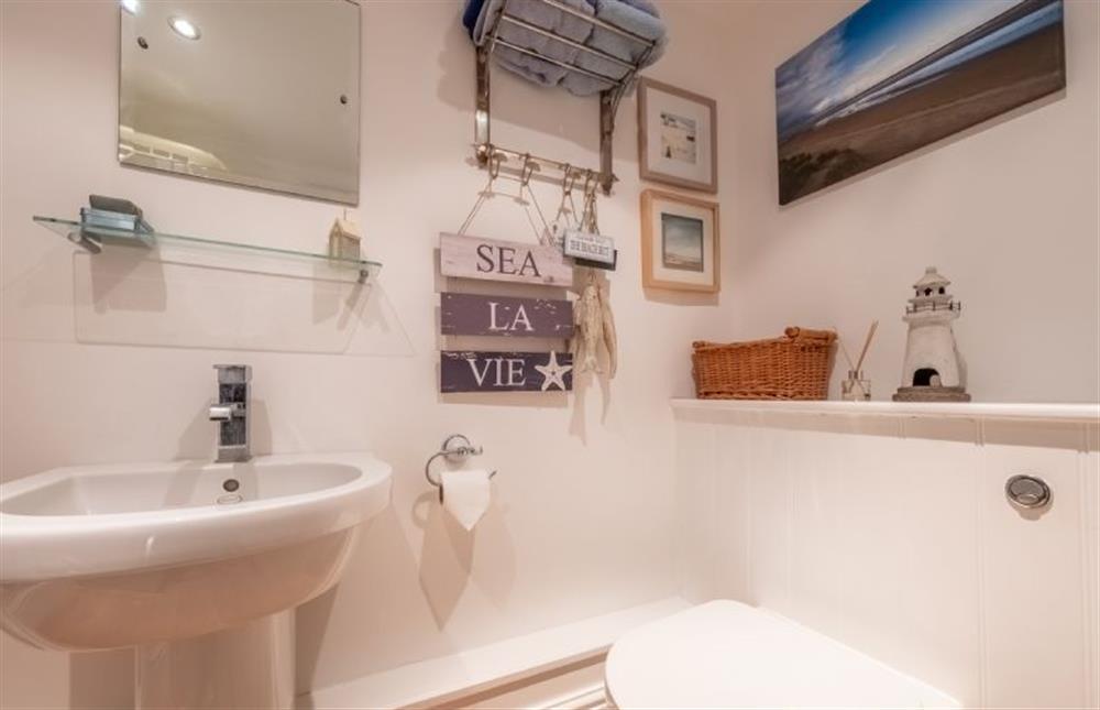 Utility/ WC with WC and wash basin at Bluebell Cottage, Little Walsingham