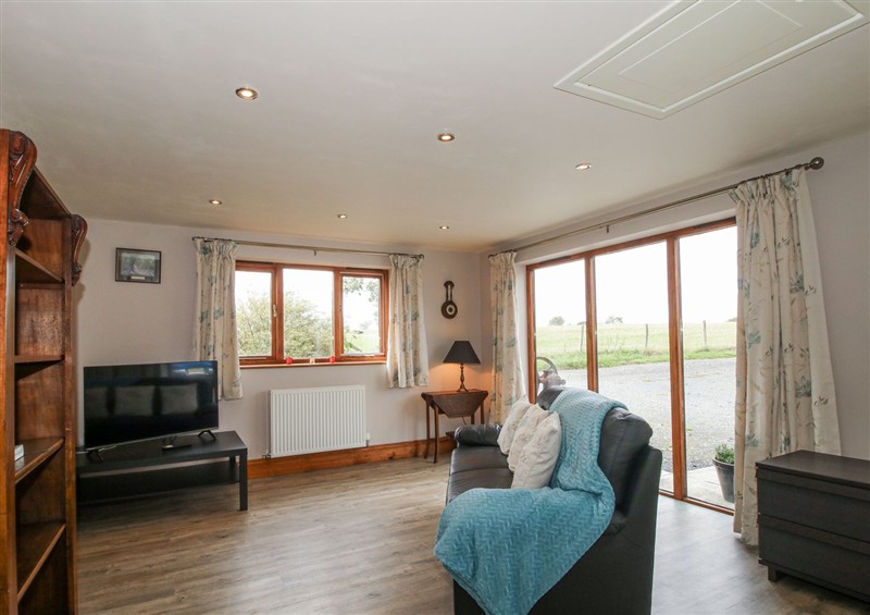 Enjoy the living room at Bluebell Cottage, Tenbury Wells
