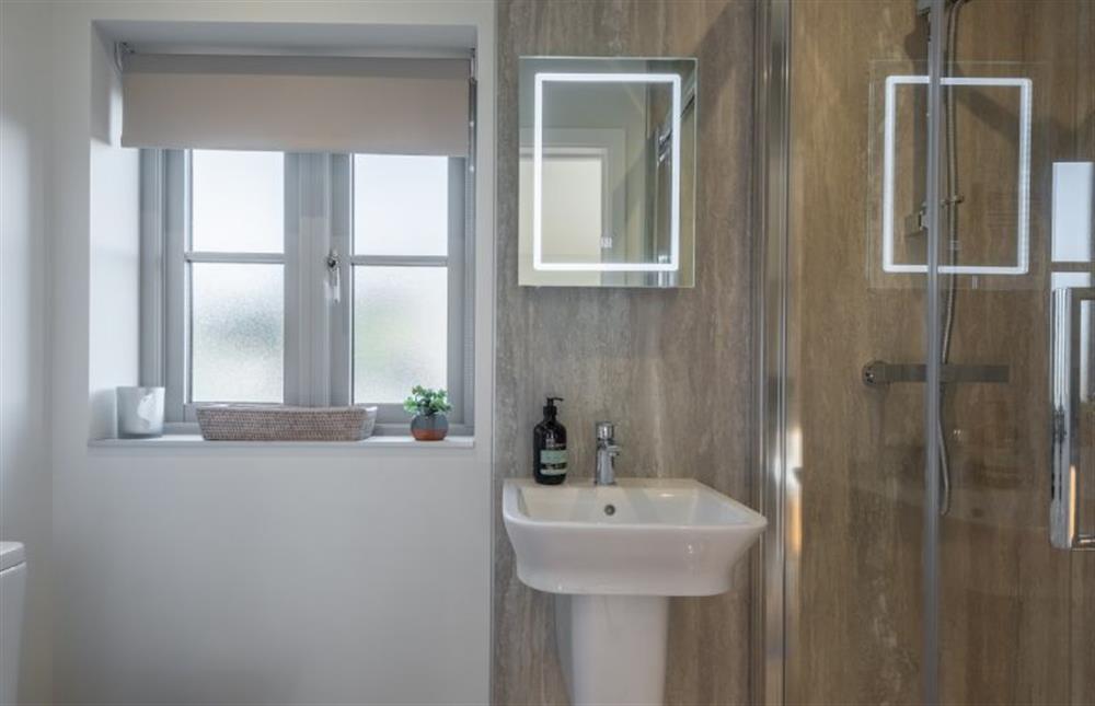 First floor: En-suite with shower, wash basin and WC (photo 2) at Bluebell Cottage, Thornham near Hunstanton