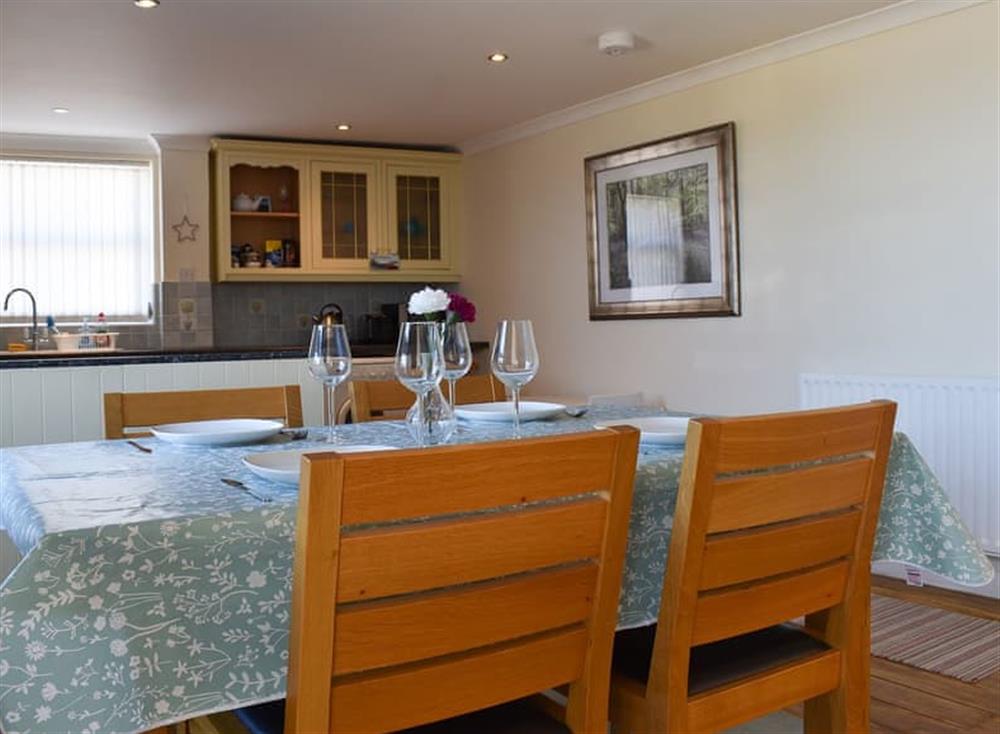 Dining and kitchen areas at Bluebell Cottage in Whitstable, Kent