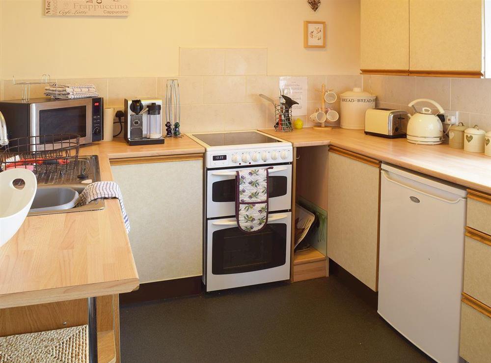 The spacious and bright kitchen area makes cooking a delight at Blueberry Cottage in Debenham, near Framlingham, Suffolk