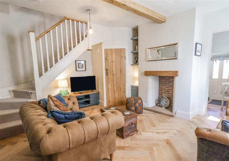 Relax in the living area at Bluefin Cottage, Whitby