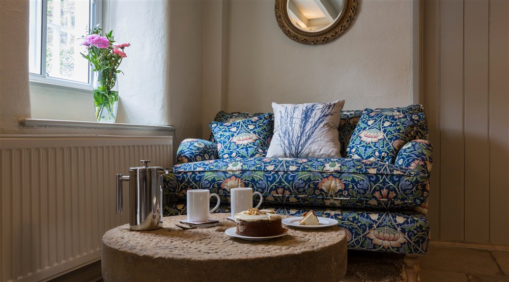 The snug area of the dining room at Boar Mill Cottage in Corfe Castle, Dorset