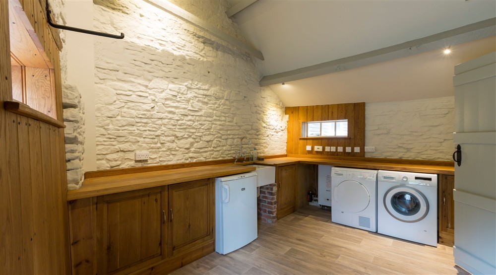 The utility room at Boar Mill Cottage in Corfe Castle, Dorset
