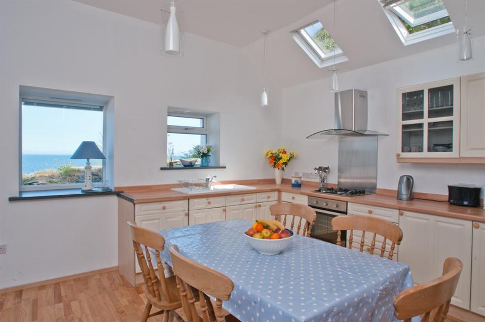 Newly fitted kitchen and dining area at Boathouse Cottage in Torcross, Kingsbridge