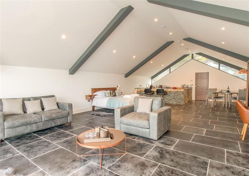 Relax in the living area at Boathouse on the Lake, Bowness-On-Windermere