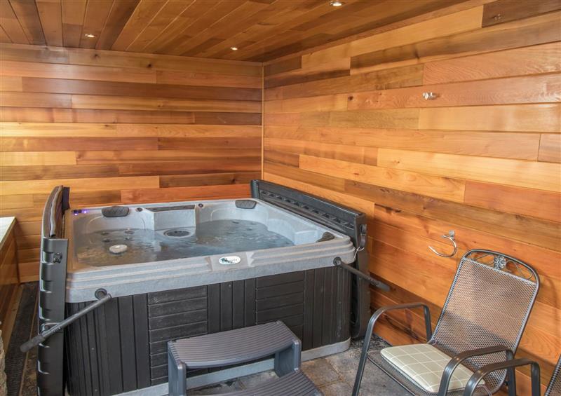 Spend some time in the hot tub at Boathouse on the Lake, Bowness-On-Windermere