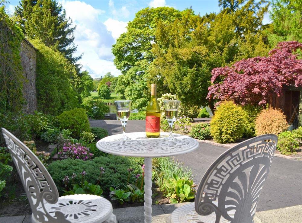 Sitting out area overlooking the beautiful garden and grounds at Boatland Cottage in Perth, Perthshire