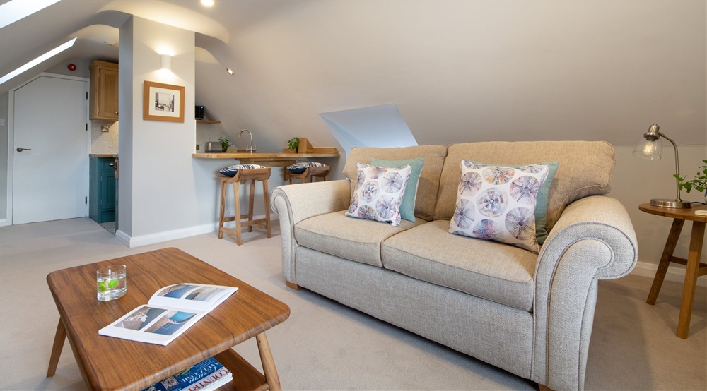 The open-plan kitchen, sitting and dining room (photo 2) at Boatman's Loft in Whitby, North Yorkshire
