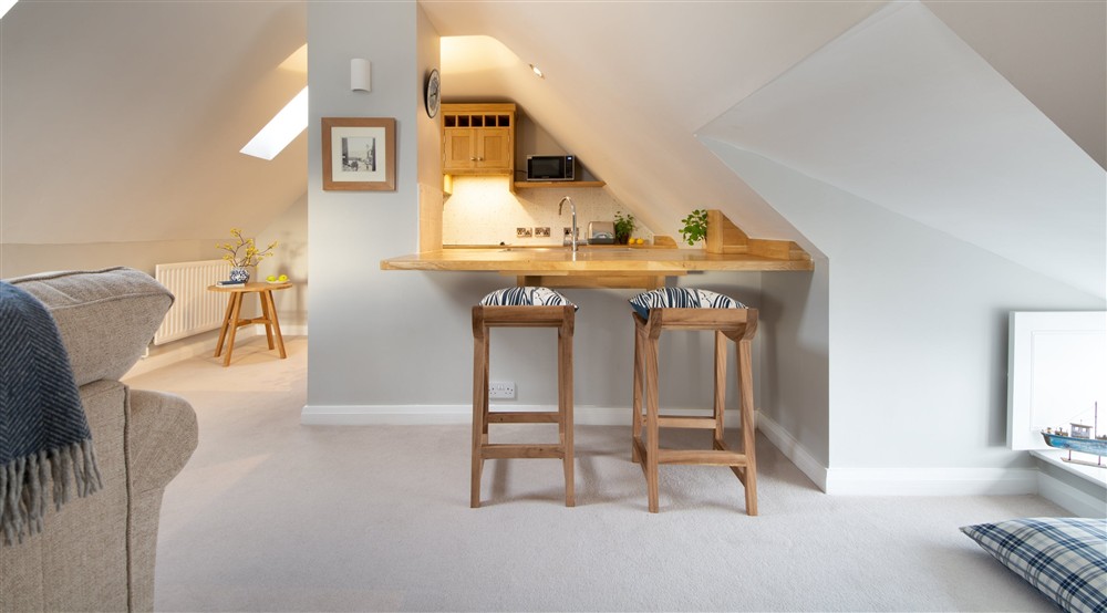 The open-plan kitchen, sitting and dining room (photo 3) at Boatman's Loft in Whitby, North Yorkshire